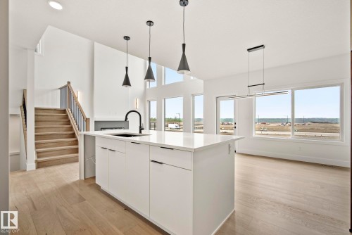 7095 Kiviaq Crescent, Edmonton, AB - Indoor Photo Showing Kitchen With Upgraded Kitchen