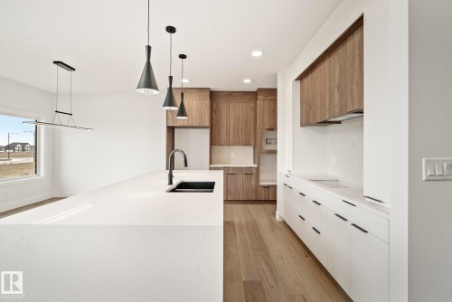7095 Kiviaq Crescent, Edmonton, AB - Indoor Photo Showing Kitchen With Double Sink With Upgraded Kitchen