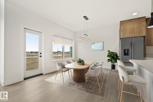 7095 Kiviaq Crescent, Edmonton, AB - Indoor Photo Showing Dining Room