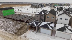 Snowy aerial view with a residential view - 