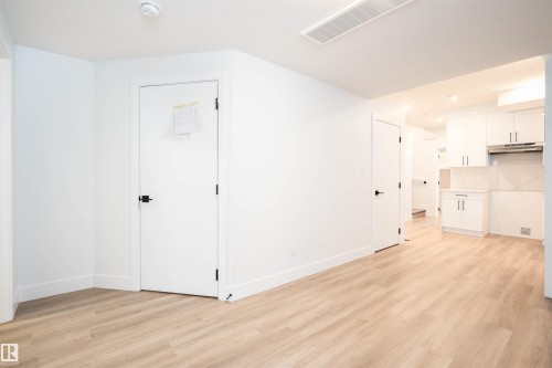 Additional living space with light wood finished floors - 430 Crystal Creek Link, Leduc, AB - Indoor