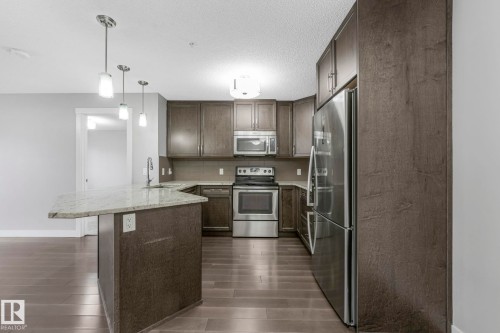115 2207 44 Avenue, Edmonton, AB - Indoor Photo Showing Kitchen With Stainless Steel Kitchen With Upgraded Kitchen