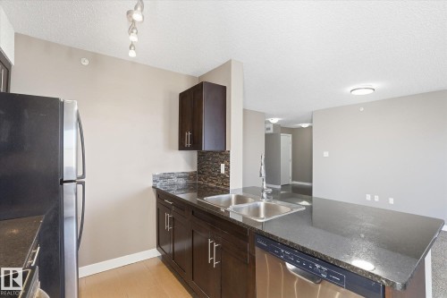 402 11803 22 Avenue, Edmonton, AB - Indoor Photo Showing Kitchen With Stainless Steel Kitchen With Double Sink With Upgraded Kitchen