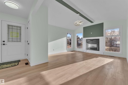 3808 17A Avenue, Edmonton, AB - Indoor Photo Showing Other Room With Fireplace