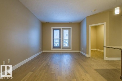 149 6079 Maynard Way Nw, Edmonton, AB - Indoor Photo Showing Other Room