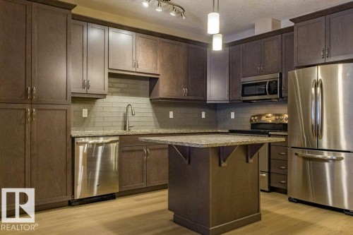 149 6079 Maynard Way Nw, Edmonton, AB - Indoor Photo Showing Kitchen With Upgraded Kitchen