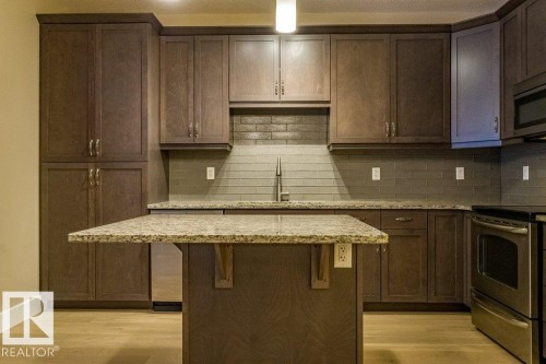149 6079 Maynard Way Nw, Edmonton, AB - Indoor Photo Showing Kitchen With Upgraded Kitchen
