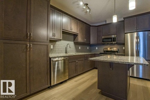 149 6079 Maynard Way Nw, Edmonton, AB - Indoor Photo Showing Kitchen With Upgraded Kitchen