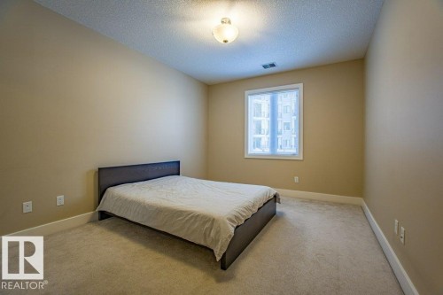 149 6079 Maynard Way Nw, Edmonton, AB - Indoor Photo Showing Bedroom