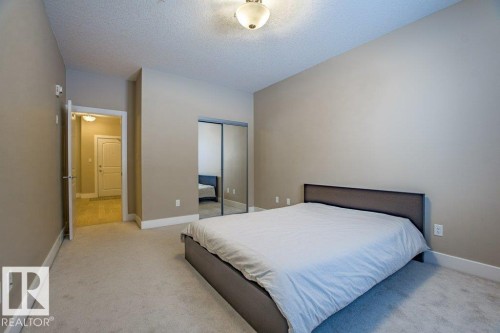 149 6079 Maynard Way Nw, Edmonton, AB - Indoor Photo Showing Bedroom