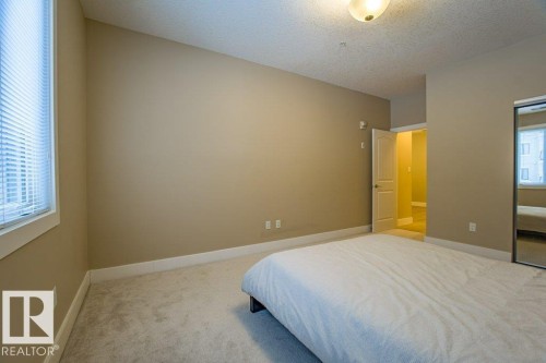 149 6079 Maynard Way Nw, Edmonton, AB - Indoor Photo Showing Bedroom
