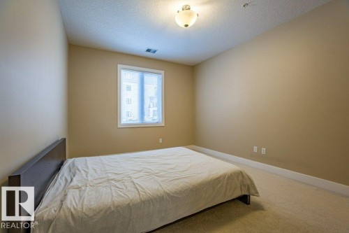 149 6079 Maynard Way Nw, Edmonton, AB - Indoor Photo Showing Bedroom