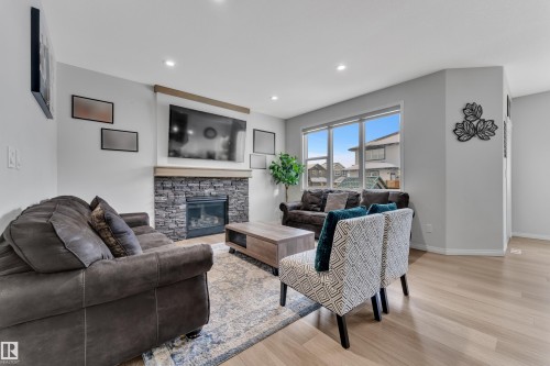 2356 53 Street Sw, Edmonton, AB - Indoor Photo Showing Living Room With Fireplace