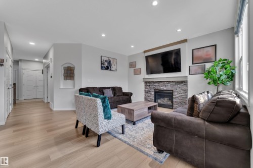 2356 53 Street Sw, Edmonton, AB - Indoor Photo Showing Living Room With Fireplace