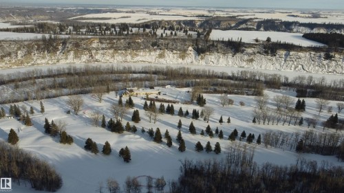 View of snowy aerial view - 131 Saskatchewan Avenue W, Devon, AB - Outdoor With Body Of Water With View