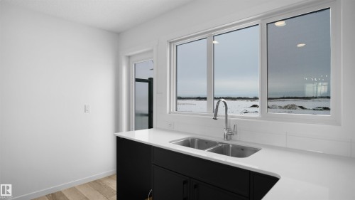 4185 Kinglet Drive, Edmonton, AB - Indoor Photo Showing Kitchen With Double Sink