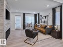 509 Aster Drive, Edmonton, AB  - Indoor Photo Showing Living Room With Fireplace 