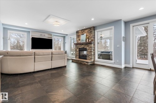 8 53305 Rge Road 273, Rural Parkland County, AB - Indoor Photo Showing Living Room With Fireplace
