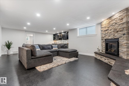 8 53305 Rge Road 273, Rural Parkland County, AB - Indoor Photo Showing Living Room With Fireplace