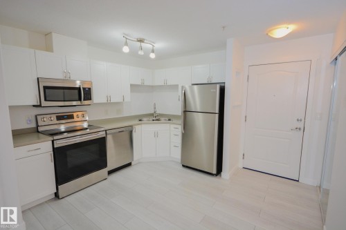 116 12550 140 Avenue, Edmonton, AB - Indoor Photo Showing Kitchen With Stainless Steel Kitchen With Double Sink