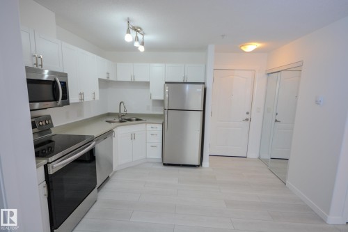 116 12550 140 Avenue, Edmonton, AB - Indoor Photo Showing Kitchen With Stainless Steel Kitchen With Double Sink