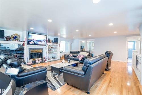 10812 5 Avenue, Edmonton, AB - Indoor Photo Showing Living Room With Fireplace