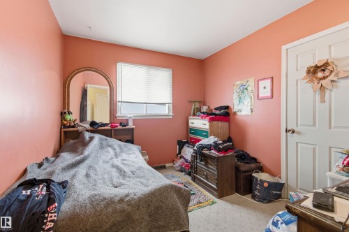 Bedroom with carpet floors - 10332 82 Street, Edmonton, AB - Indoor Photo Showing Bedroom