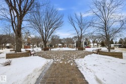 Snowy yard with a residential view - 