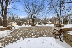 Yard covered in snow featuring a residential view - 