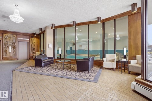 Lobby featuring a textured ceiling - 1513 13910 Stony Plain Road, Edmonton, AB - Indoor Photo Showing Other Room
