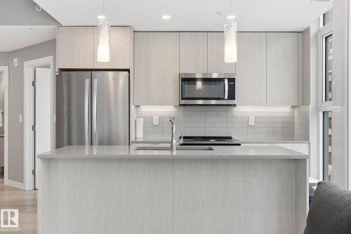 503 10180 103 Street, Edmonton, AB - Indoor Photo Showing Kitchen With Stainless Steel Kitchen With Double Sink With Upgraded Kitchen