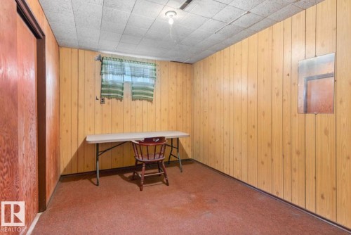 Carpeted home office with wooden walls - 3810 110 Avenue, Edmonton, AB - Indoor Photo Showing Other Room