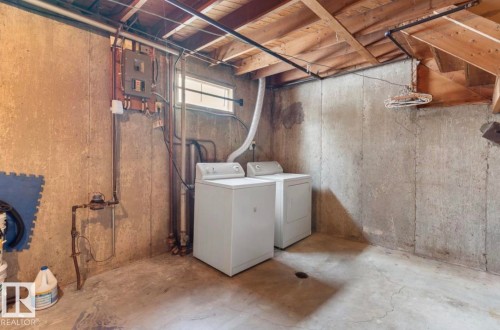 Basement featuring independent washer and dryer and electric panel - 3810 110 Avenue, Edmonton, AB - Indoor Photo Showing Laundry Room