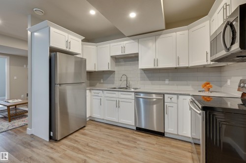 7404 81 Avenue, Edmonton, AB - Indoor Photo Showing Kitchen With Double Sink