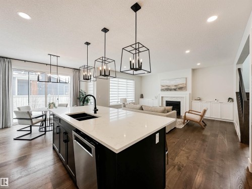 14 Laderoute Place, St. Albert, AB - Indoor Photo Showing Kitchen With Fireplace With Double Sink With Upgraded Kitchen