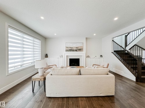 14 Laderoute Place, St. Albert, AB - Indoor Photo Showing Living Room With Fireplace