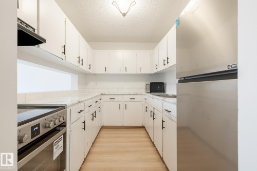 303 10620 104 Street, Edmonton, AB - Indoor Photo Showing Kitchen