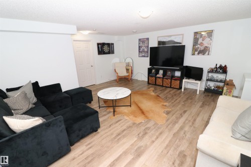 75 120 Magrath Road, Edmonton, AB - Indoor Photo Showing Living Room