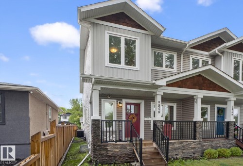 Craftsman-style home with a porch and board and batten siding - 9858 72 Avenue, Edmonton, AB - Outdoor With Deck Patio Veranda