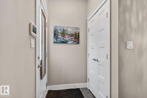 Doorway to outside with baseboards - 9858 72 Avenue, Edmonton, AB - Indoor Photo Showing Other Room