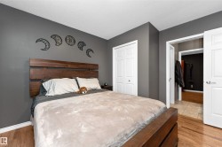 Bedroom upstairs featuring laminate flooring - 