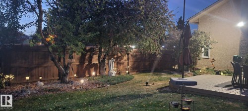 Fenced backyard with a wooden deck - 5628 188A Street, Edmonton, AB - Outdoor