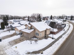 Snowy aerial view with a residential view - 