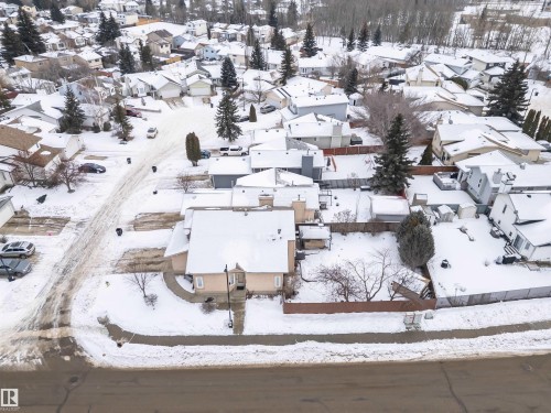 Snowy aerial view featuring a residential view - 5628 188A Street, Edmonton, AB - Outdoor With View