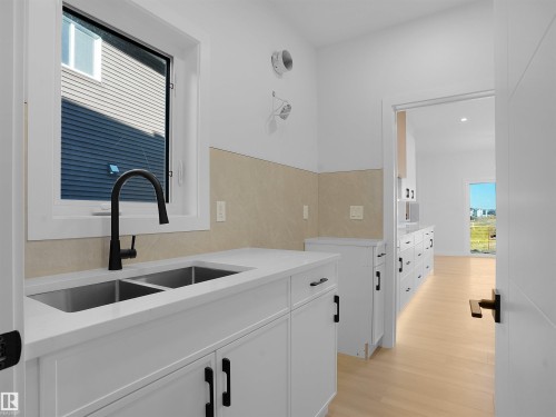3307 Chernowski Way Sw, Edmonton, AB - Indoor Photo Showing Kitchen With Double Sink