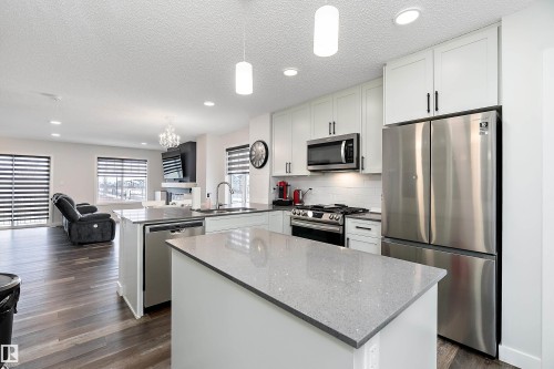1 3305 Orchards Link, Edmonton, AB - Indoor Photo Showing Kitchen With Stainless Steel Kitchen With Upgraded Kitchen