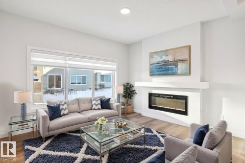 19007 20 Avenue, Edmonton, AB - Indoor Photo Showing Living Room With Fireplace
