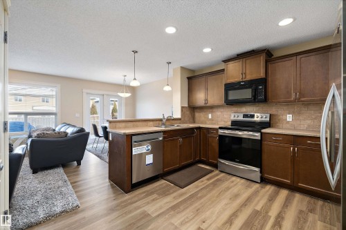 2407 Casselman Crescent, Edmonton, AB - Indoor Photo Showing Kitchen With Stainless Steel Kitchen With Double Sink