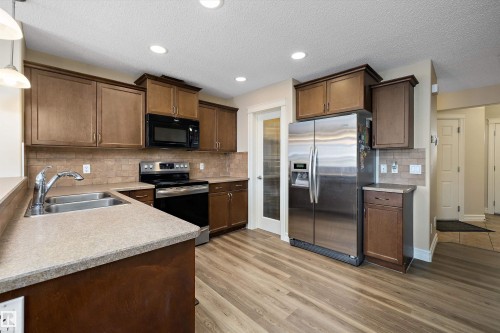 2407 Casselman Crescent, Edmonton, AB - Indoor Photo Showing Kitchen With Stainless Steel Kitchen With Double Sink