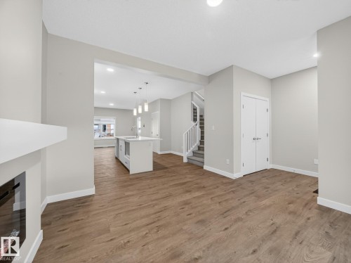 1081 Berg Place, Leduc, AB - Indoor Photo Showing Other Room With Fireplace